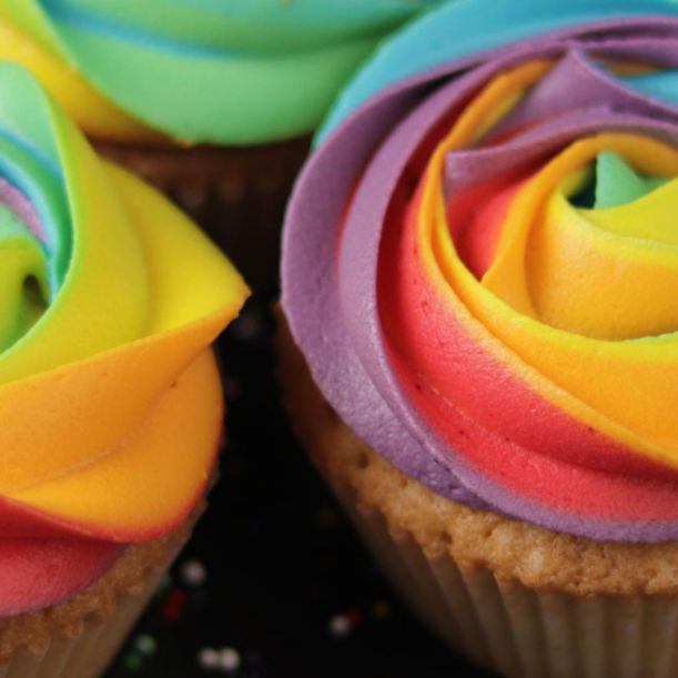 Vanilla Cupcake with Rainbow Frosting – Take a Cake Bakeries